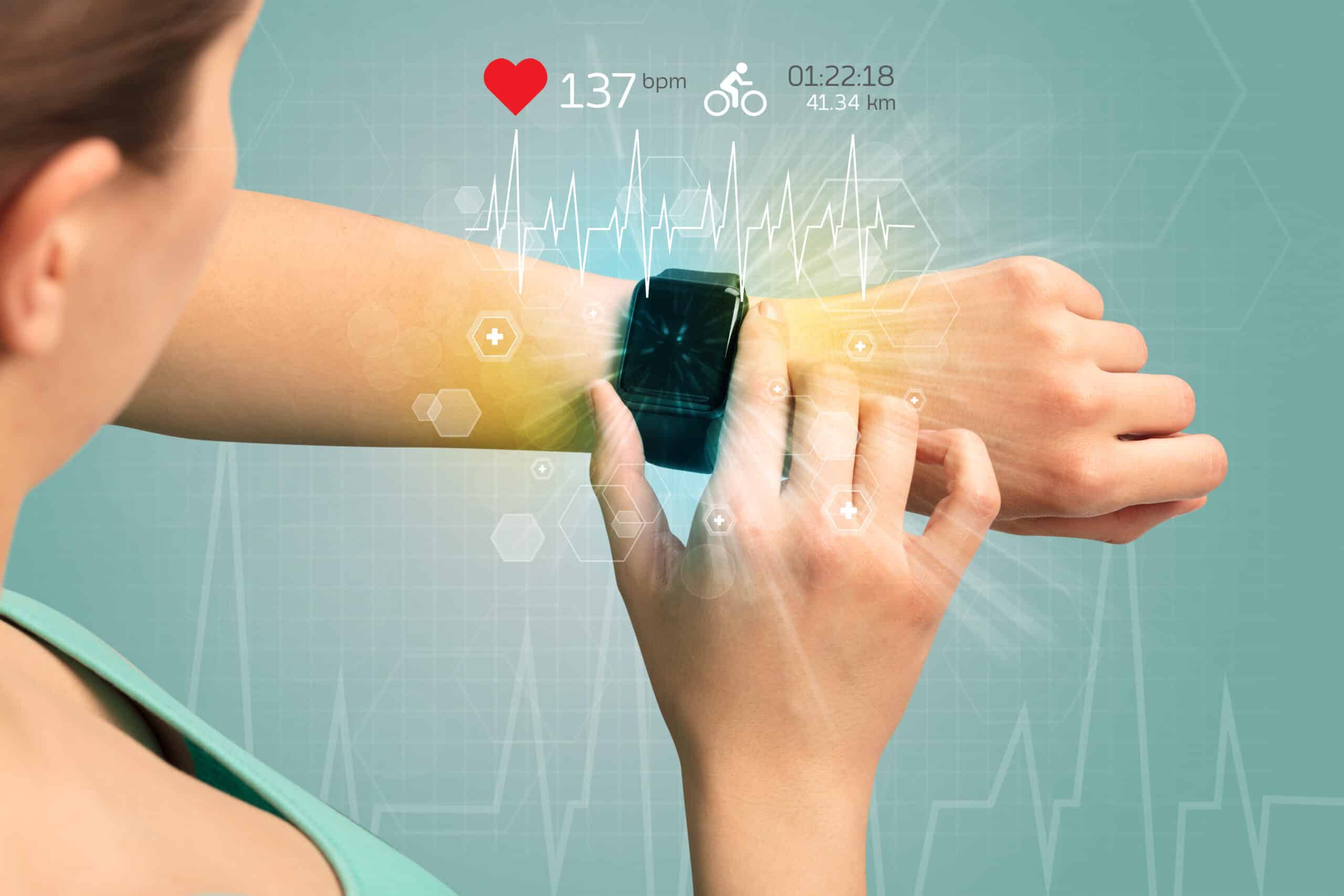 Hand,With,Smartwatch,And,Cycling,Concept,Nearby.